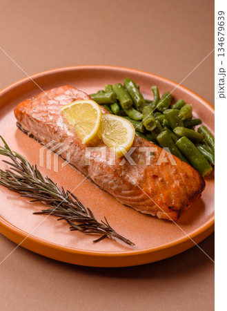 Fish, grilled salmon fillet, healthy food, seafood. Grilled salmon fillet as a background 134679639