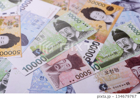 Korean paper money, won, and cash banknotes for financial transactions. Korean money Korean paper money, won, and cash banknotes for financial transactions. Korean money 134679767
