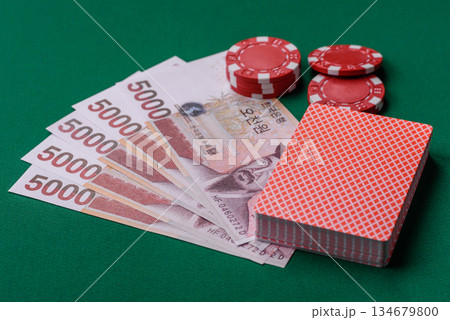 Casino game in the South Korea, won money, chips, cards. Gambling in casinos in the Korea Casino game in the South Korea, won money, chips, cards. Gambling in casinos in the Korea 134679800