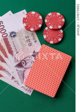 Casino game in the South Korea, won money, chips, cards. Gambling in casinos in the Korea 134679802