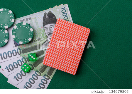 Casino game in the South Korea, won money, chips, cards. Gambling in casinos in the Korea 134679805