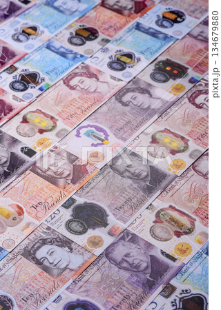 Britain paper money, pound sterling, cash banknotes for financial transactions. Britain money Britain paper money, pound sterling, cash banknotes for financial transactions. Britain money 134679880