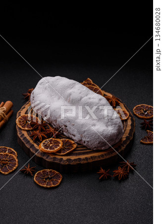 Stollen, a German Christmas pastry for the winter holidays. Stollen as a food background 134680028