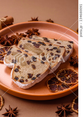 Stollen, a German Christmas pastry for the winter holidays. Stollen as a food background 134680091