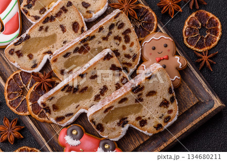 Stollen, a German Christmas pastry for the winter holidays. Stollen as a food background 134680211
