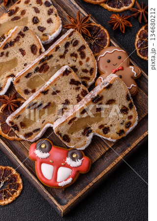 Stollen, a German Christmas pastry for the winter holidays. Stollen as a food background 134680212