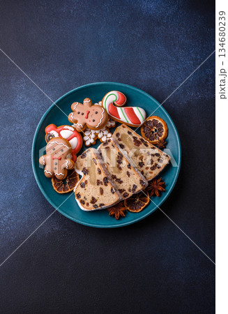 Stollen, a German Christmas pastry for the winter holidays. Stollen as a food background 134680239