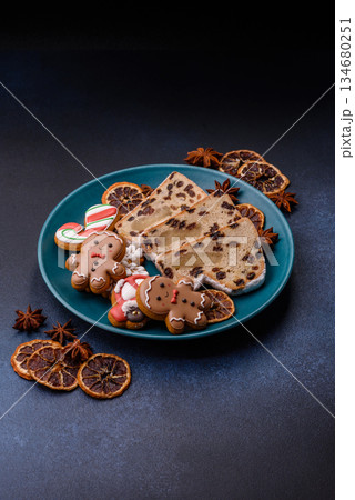 Stollen, a German Christmas pastry for the winter holidays. Stollen as a food background 134680251