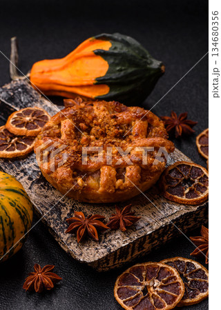 Apple or pumpkin pie or tart is a sweet American autumn treat. American apple pie Apple or pumpkin pie or tart is a sweet American autumn treat. American apple pie 134680356