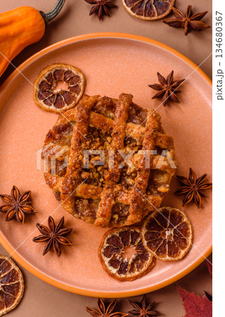 Apple or pumpkin pie or tart is a sweet American autumn treat. American apple pie Apple or pumpkin pie or tart is a sweet American autumn treat. American apple pie 134680367