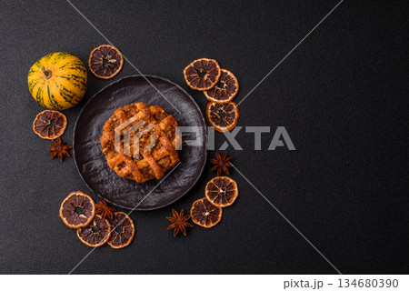 Apple or pumpkin pie or tart is a sweet American autumn treat. American apple pie Apple or pumpkin pie or tart is a sweet American autumn treat. American apple pie 134680390