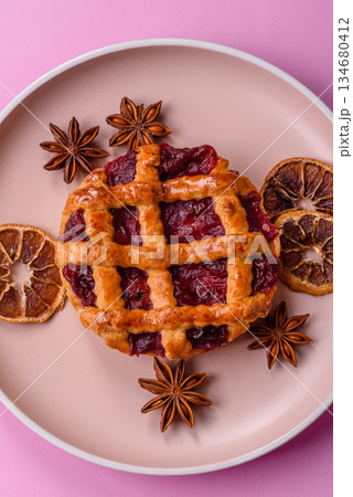 Cherry or strawberry sweet American Christmas pie or tart. American cherry pie Cherry or strawberry sweet American Christmas pie or tart. American cherry pie 134680412