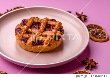 Cherry or strawberry sweet American Christmas pie or tart. American cherry pie 134680414