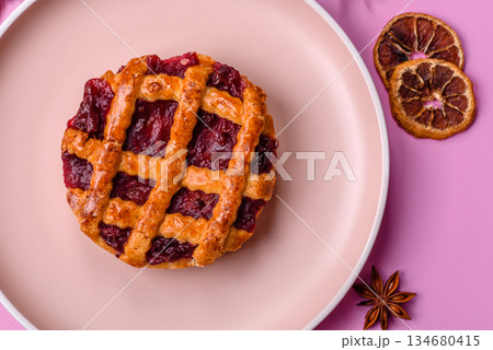 Cherry or strawberry sweet American Christmas pie or tart. American cherry pie Cherry or strawberry sweet American Christmas pie or tart. American cherry pie 134680415
