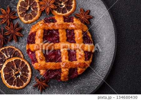 Cherry or strawberry sweet American Christmas pie or tart. American cherry pie Cherry or strawberry sweet American Christmas pie or tart. American cherry pie 134680430