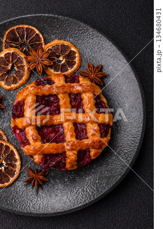 Cherry or strawberry sweet American Christmas pie or tart. American cherry pie 134680431