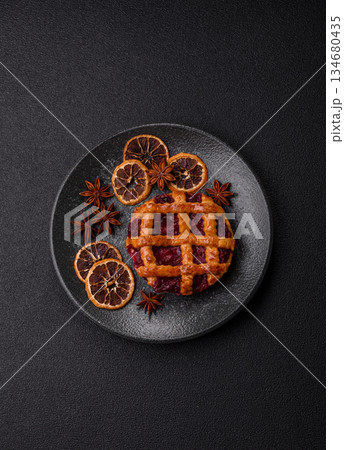 Cherry or strawberry sweet American Christmas pie or tart. American cherry pie 134680435