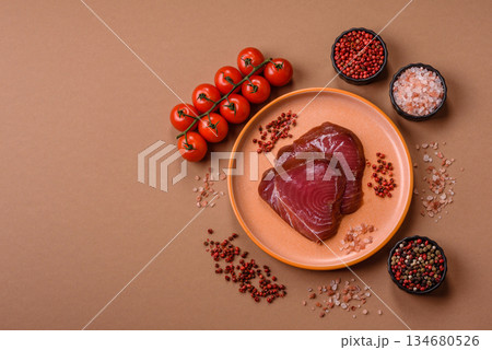 Tuna steak for sashimi or sushi, smoked fish. Tuna steak as a food background 134680526