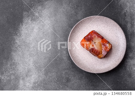 Tuna and salmon roll, smoked fish. Tuna and salmon roll as a food background 134680558