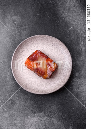 Tuna and salmon roll, smoked fish. Tuna and salmon roll as a food background 134680559