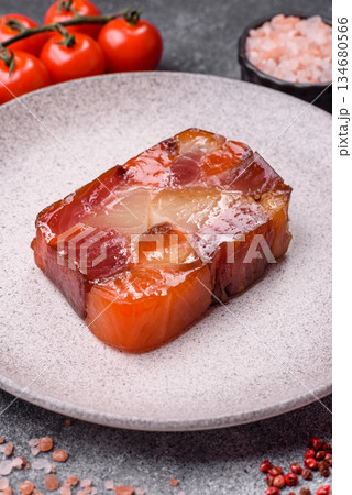 Tuna and salmon roll, smoked fish. Tuna and salmon roll as a food background 134680566