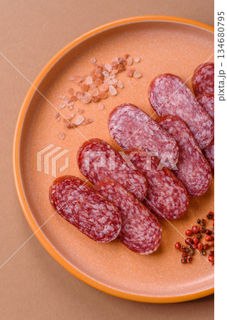Smoked salami slices, beef or chicken sausage for sandwiches. Salami slices 134680795
