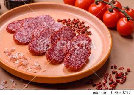 Smoked salami slices, beef or chicken sausage for sandwiches. Salami slices Smoked salami slices, beef or chicken sausage for sandwiches. Salami slices 134680797