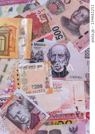 Money background, currency exchange, paper banknotes from different countries. Money cash currency Money background, currency exchange, paper banknotes from different countries. Money cash currency 134681251