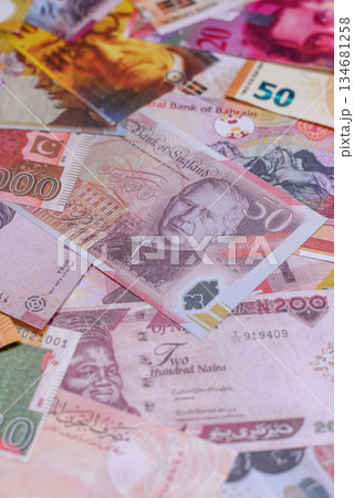 Money background, currency exchange, paper banknotes from different countries. Money cash currency Money background, currency exchange, paper banknotes from different countries. Money cash currency 134681258