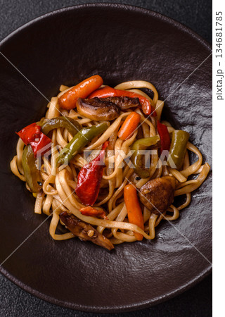 Asian food, noodles with vegetables, vegetarian dish with spicy sauce. Noodles with vegetables 134681785