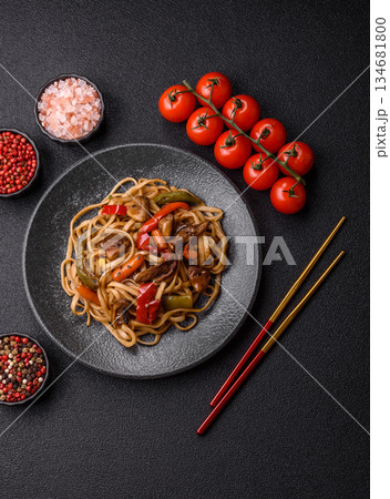 Asian food, noodles with vegetables, vegetarian dish with spicy sauce. Noodles with vegetables Asian food, noodles with vegetables, vegetarian dish with spicy sauce. Noodles with vegetables 134681800