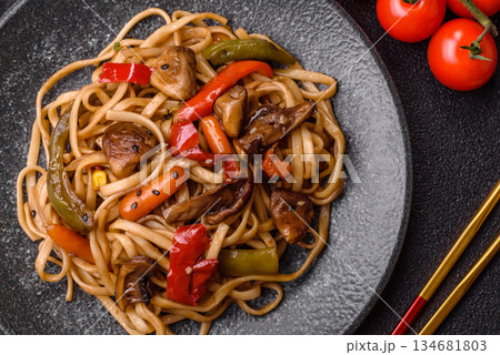 Asian food, noodles with vegetables, vegetarian dish with spicy sauce. Noodles with vegetables 134681803