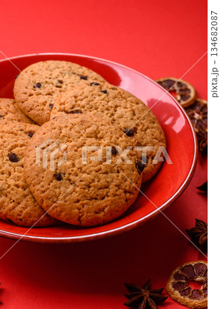 Food, oatmeal chocolate raisin cookies, dessert or breakfast pastry. Oatmeal chocolate cookies 134682087