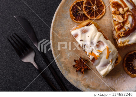 Cinnabon, a sweet cinnamon pastry, a high calorie bun or roll. Cinnabon with cinnamon 134682246