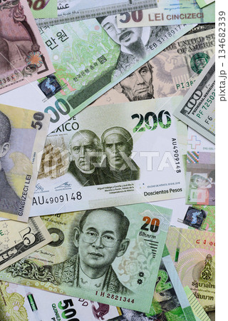 Money background, currency, paper banknotes from different countries. Money cash currency, green Money background, currency, paper banknotes from different countries. Money cash currency, green 134682339