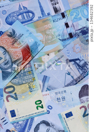 Money background, currency, paper banknotes from different countries. Money cash currency, blue Money background, currency, paper banknotes from different countries. Money cash currency, blue 134682392
