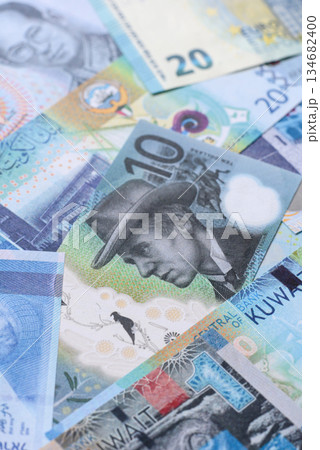 Money background, currency, paper banknotes from different countries. Money cash currency, blue 134682400