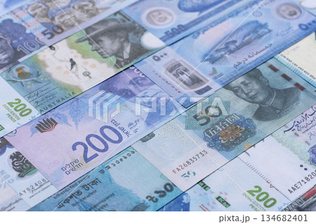 Money background, currency, paper banknotes from different countries. Money cash currency, blue Money background, currency, paper banknotes from different countries. Money cash currency, blue 134682401
