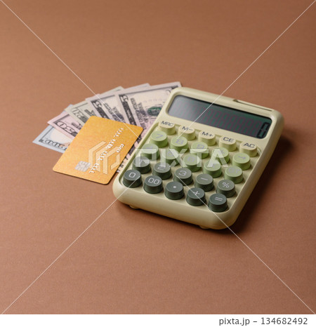 Calculator, money and expense calculations, tax form completion. Calculator, expense calculations Calculator, money and expense calculations, tax form completion. Calculator, expense calculations 134682492