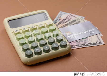 Calculator, money and expense calculations, tax form completion. Calculator, expense calculations Calculator, money and expense calculations, tax form completion. Calculator, expense calculations 134682498