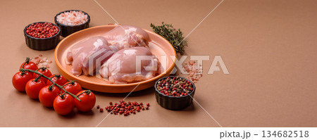 Chicken thigh fillet, skinless and boneless meat for grilling or barbecue. Chicken thigh fillet Chicken thigh fillet, skinless and boneless meat for grilling or barbecue. Chicken thigh fillet 134682518