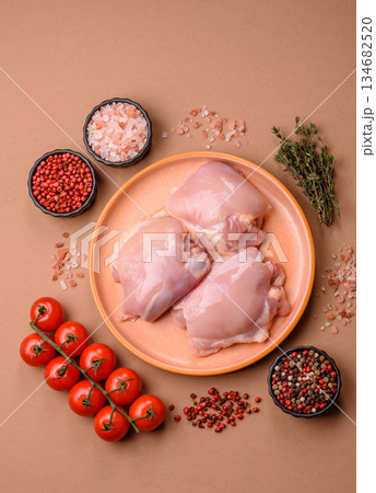 Chicken thigh fillet, skinless and boneless meat for grilling or barbecue. Chicken thigh fillet Chicken thigh fillet, skinless and boneless meat for grilling or barbecue. Chicken thigh fillet 134682520
