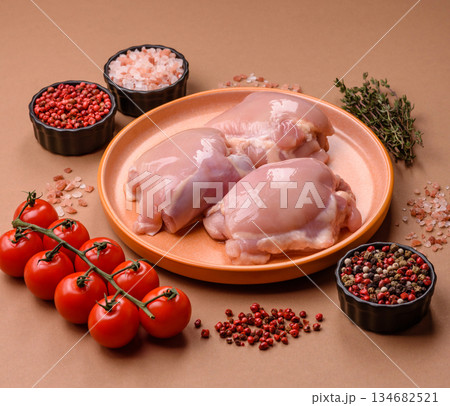 Chicken thigh fillet, skinless and boneless meat for grilling or barbecue. Chicken thigh fillet Chicken thigh fillet, skinless and boneless meat for grilling or barbecue. Chicken thigh fillet 134682521