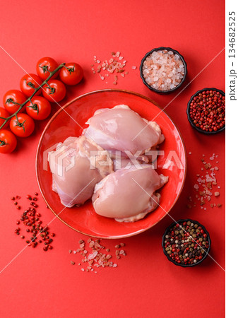 Chicken thigh fillet, skinless and boneless meat for grilling or barbecue. Chicken thigh fillet Chicken thigh fillet, skinless and boneless meat for grilling or barbecue. Chicken thigh fillet 134682525