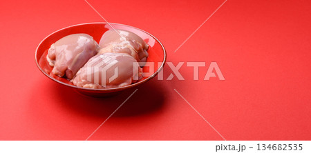 Chicken thigh fillet, skinless and boneless meat for grilling or barbecue. Chicken thigh fillet Chicken thigh fillet, skinless and boneless meat for grilling or barbecue. Chicken thigh fillet 134682535