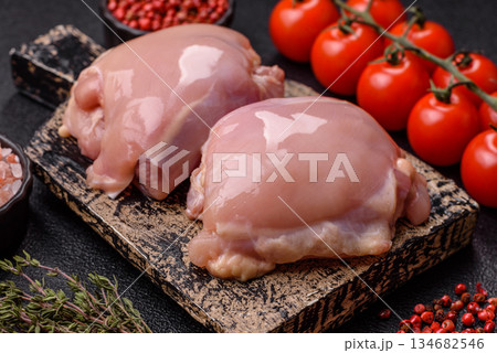 Chicken thigh fillet, skinless and boneless meat for grilling or barbecue. Chicken thigh fillet 134682546