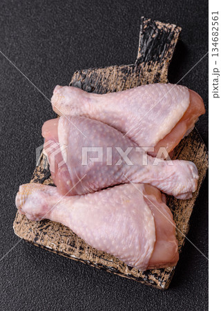 Raw chicken legs, poultry meat for grilling or barbecue. Chicken legs Raw chicken legs, poultry meat for grilling or barbecue. Chicken legs 134682561