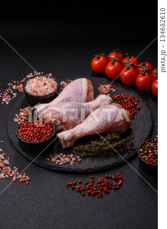 Raw chicken legs, poultry meat for grilling or barbecue. Chicken legs Raw chicken legs, poultry meat for grilling or barbecue. Chicken legs 134682610