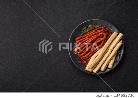 Grissini breadsticks, an Italian wheat pastry, are a great lunch snack. Grissini breadsticks Grissini breadsticks, an Italian wheat pastry, are a great lunch snack. Grissini breadsticks 134682736
