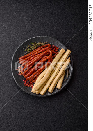 Grissini breadsticks, an Italian wheat pastry, are a great lunch snack. Grissini breadsticks 134682737